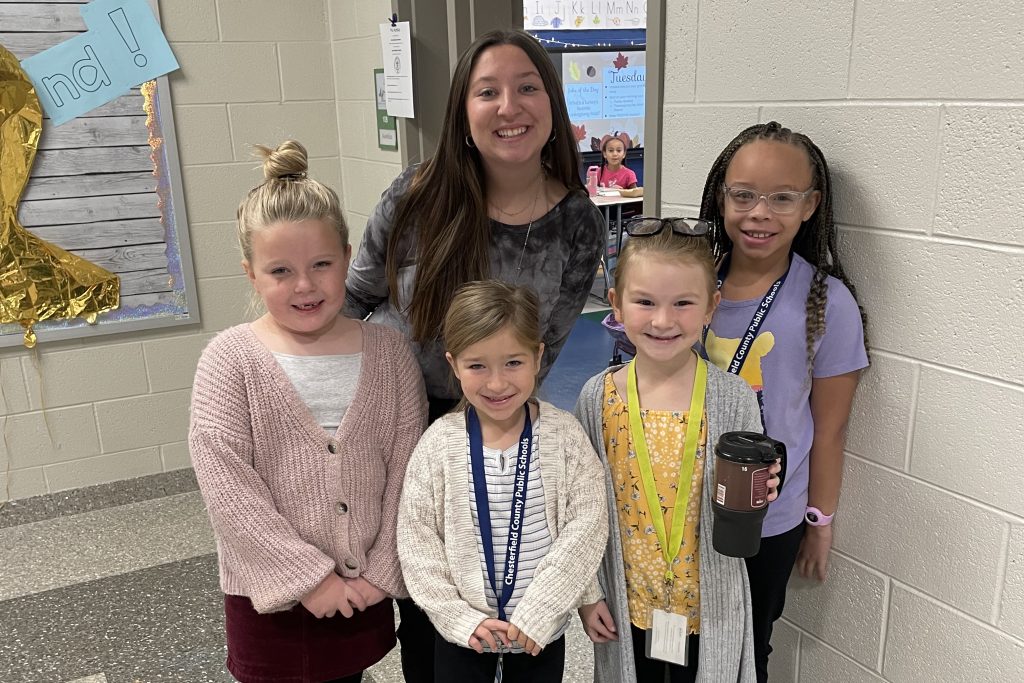 Aurelius girls dressed up as teachers