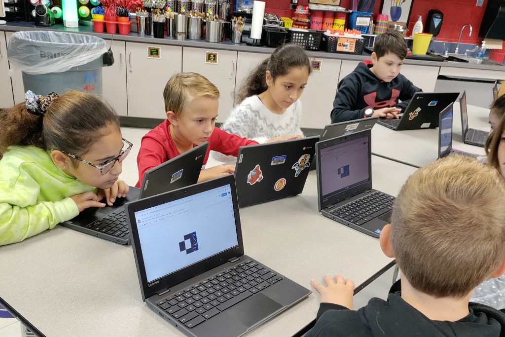 students working on their computers