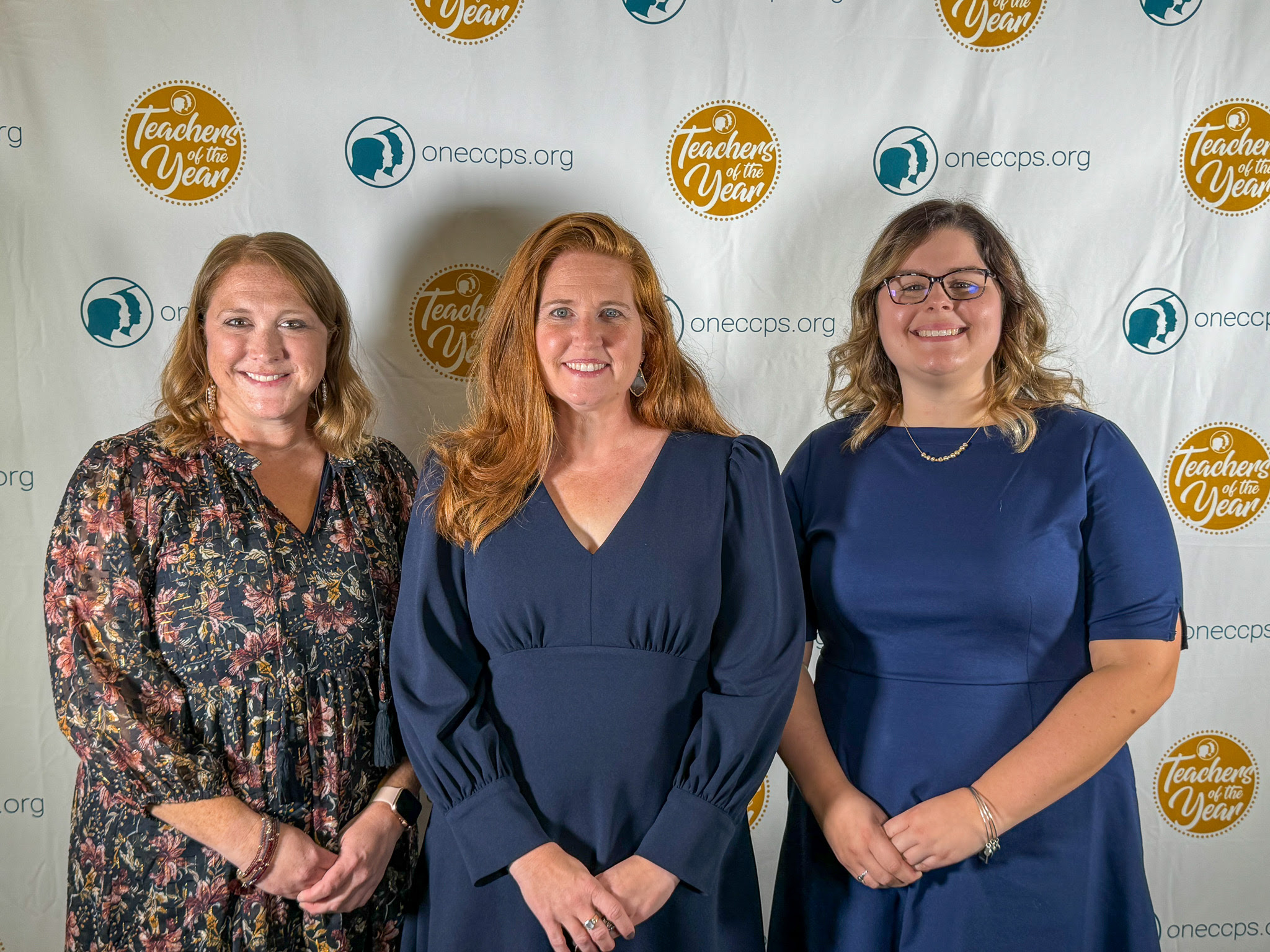 Top three Teachers of the Year taking a group photo