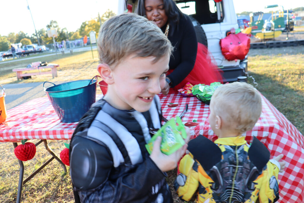 Two children participating in trunk or treat