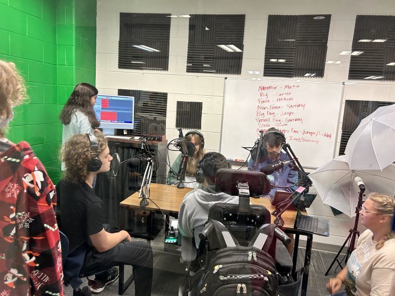 Students working in a recording studio