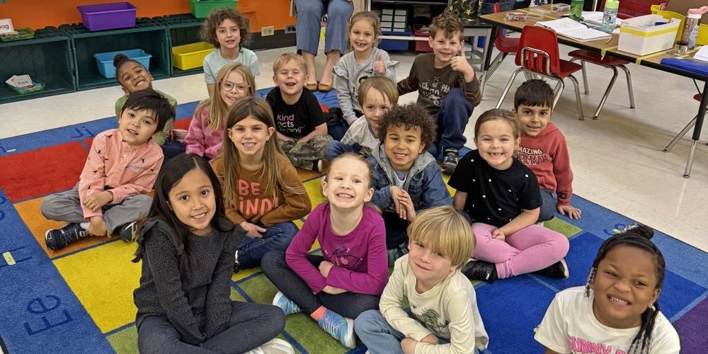 A group of students smiling