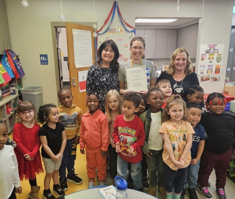 Lisa Gwaltney with representatives from DKG and her students