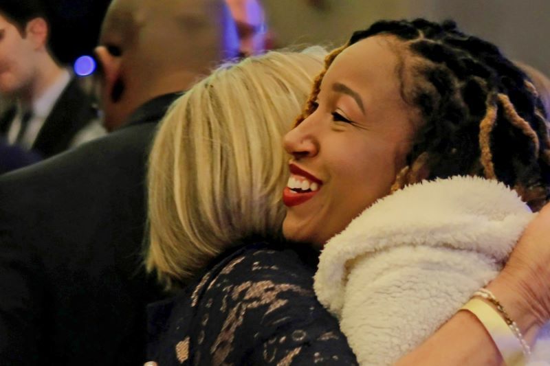 Two women hugging