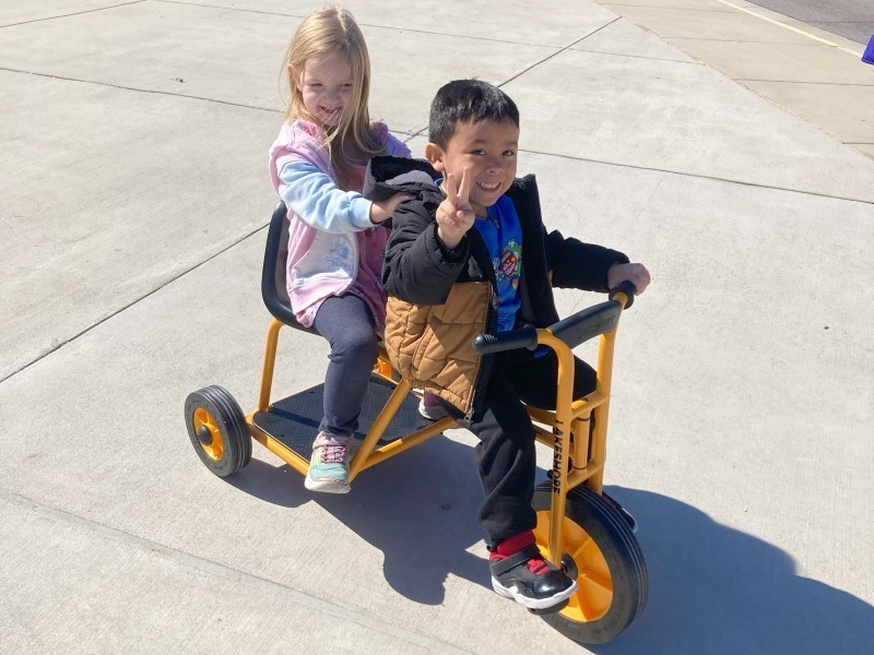 Two children on the Taxi Trike