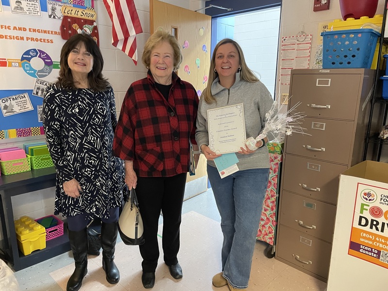 Jessica sutton with representatives from DKG