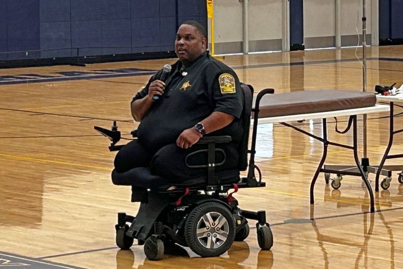 Brad Hughes speaking to students