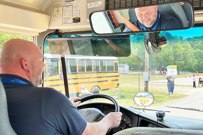principal driving bus