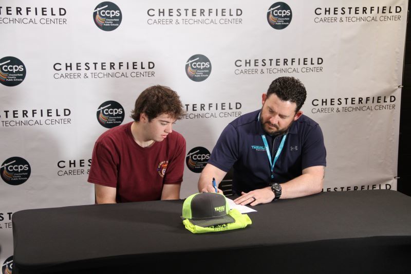 Student signing