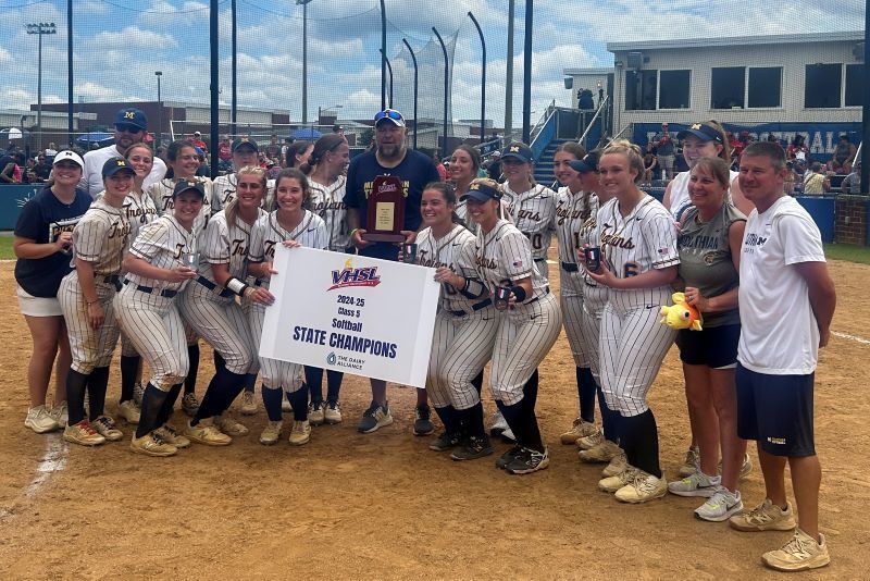 Midlothian High softball team posing with state champs sign