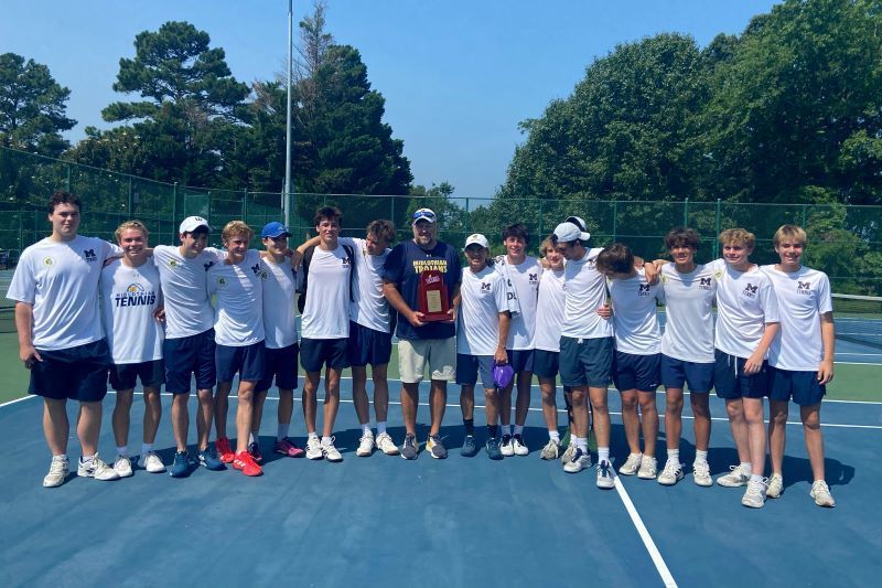 Midlothian Tennis team posing with coach