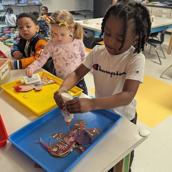 Children making gingerbread crafts