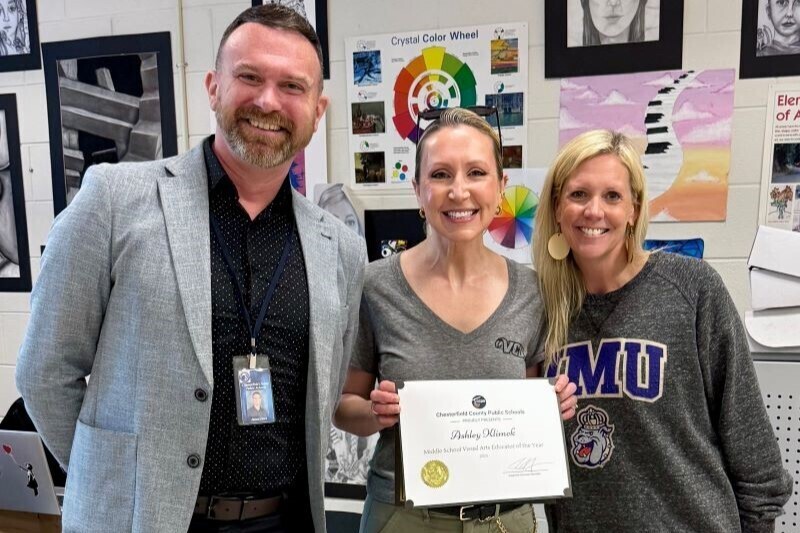 Teacher receiving thei award