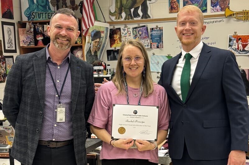 Teacher receiving thei award