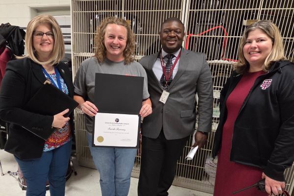 Sarah Ramsey receiving an award